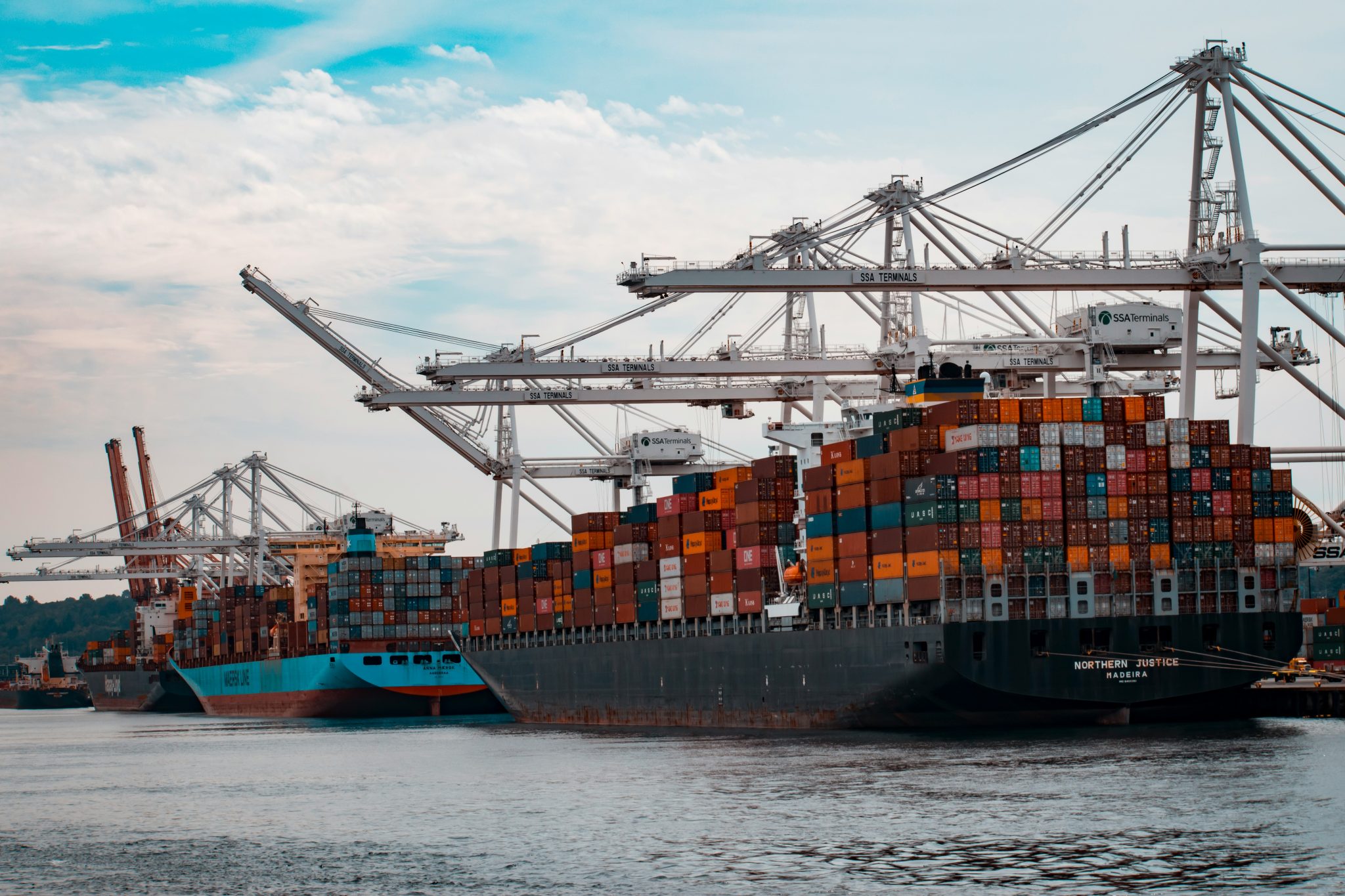 Cargo vessel loaded with freight containers for export buyers