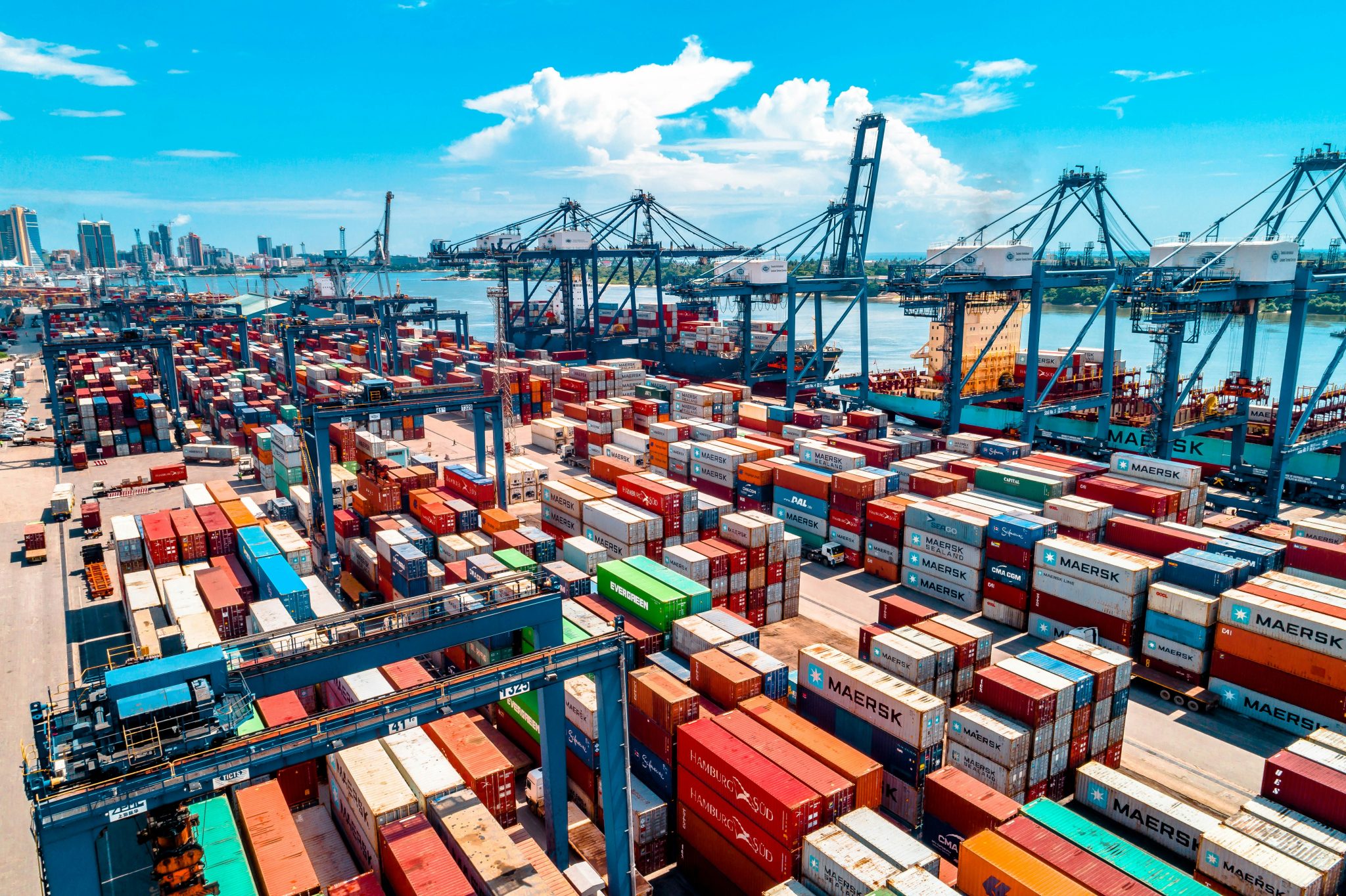 Stacked shipping containers at a trading port used for food import and export
