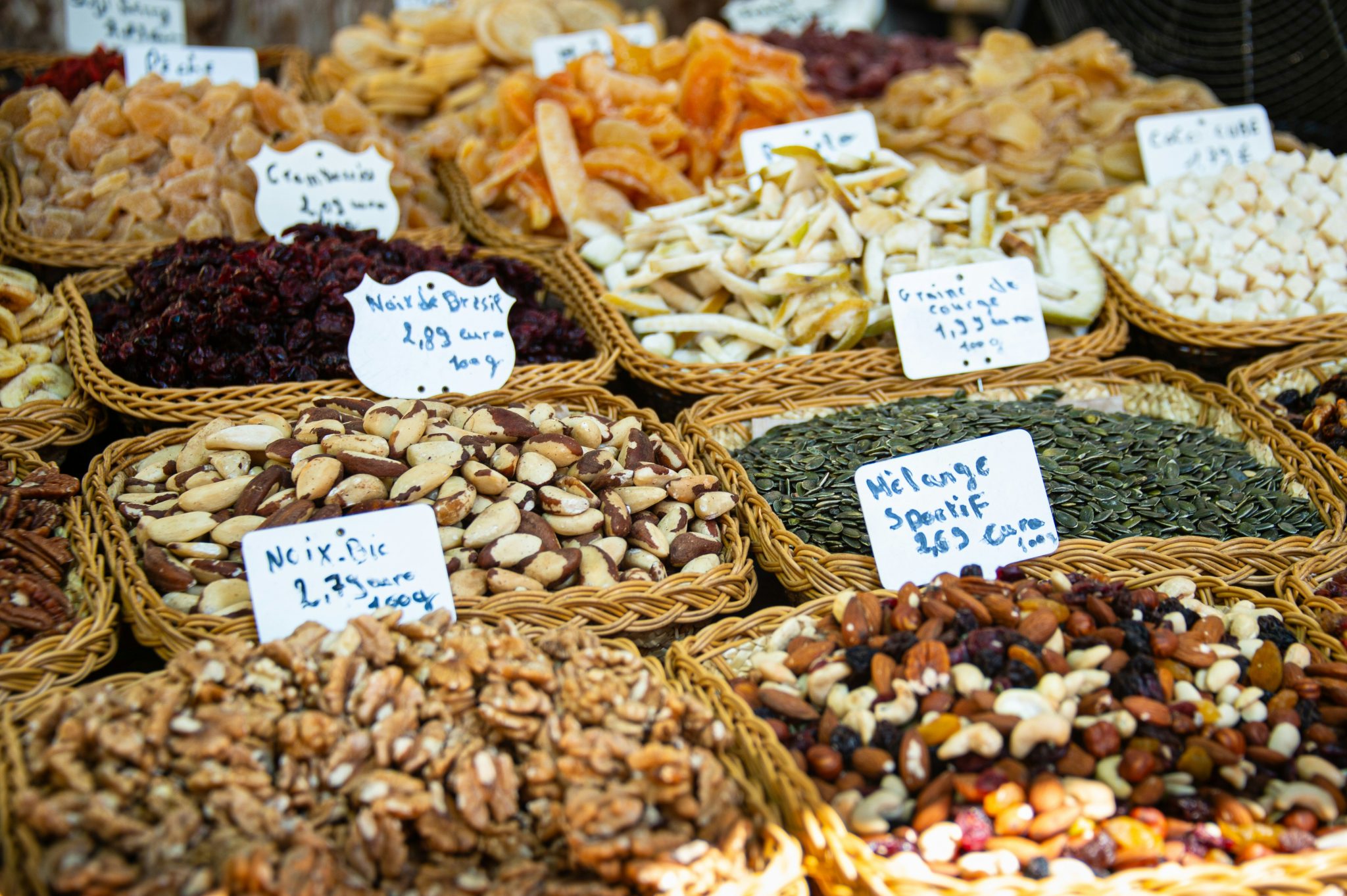Baskets of mixed nuts and dried fruit ready for packing