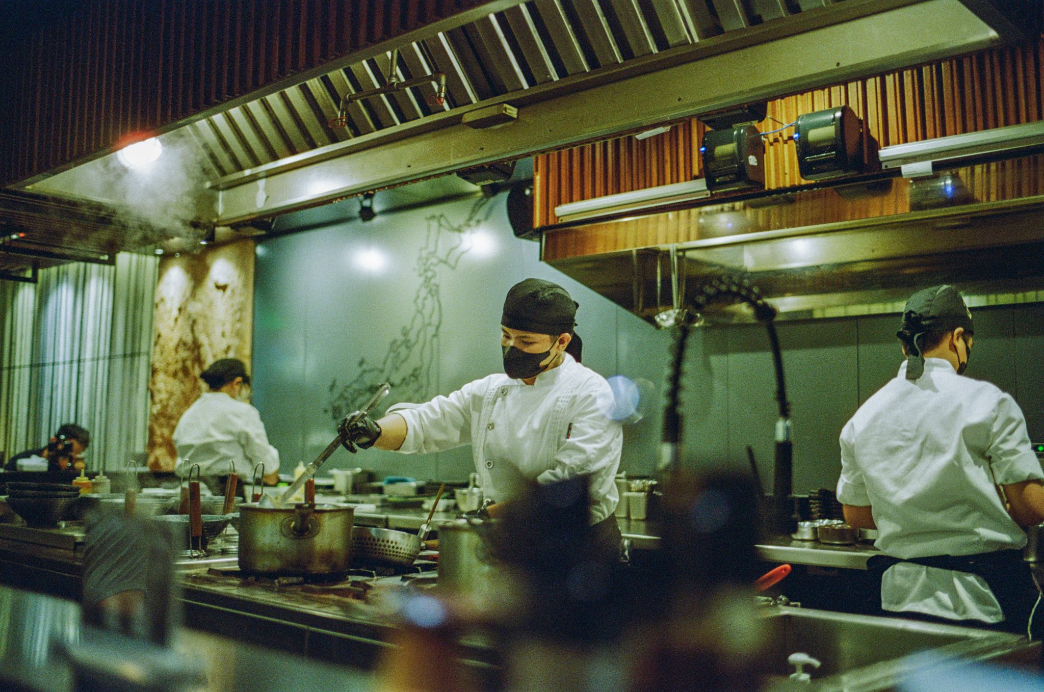 Commercial kitchen brigade at work in a catering operation